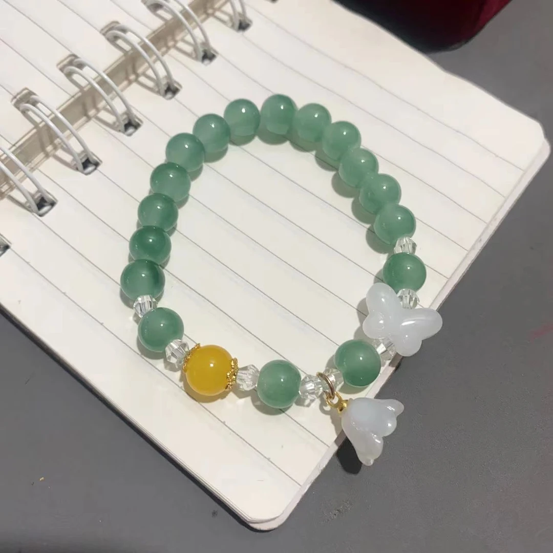 HJ-7009绿手串配白蝴蝶鸡油黄顶珠DR（颜色微色差拍一发一）