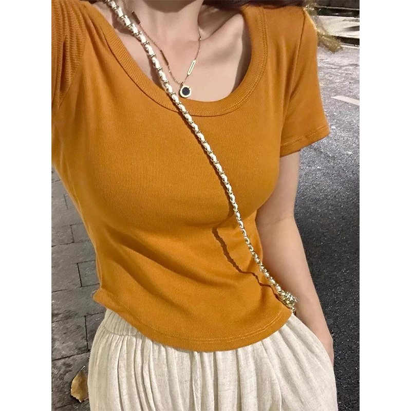 南瓜橘圆领正肩短袖T恤女夏弧形下摆设计感高腰修身短款露脐上衣1