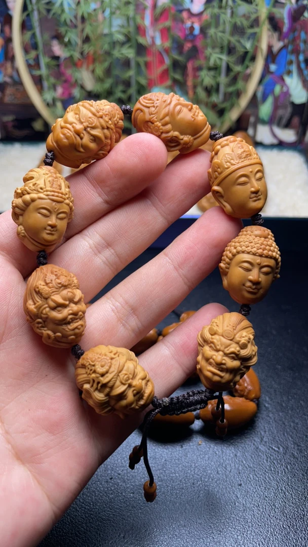 1橄榄核雕刻1.9万佛头