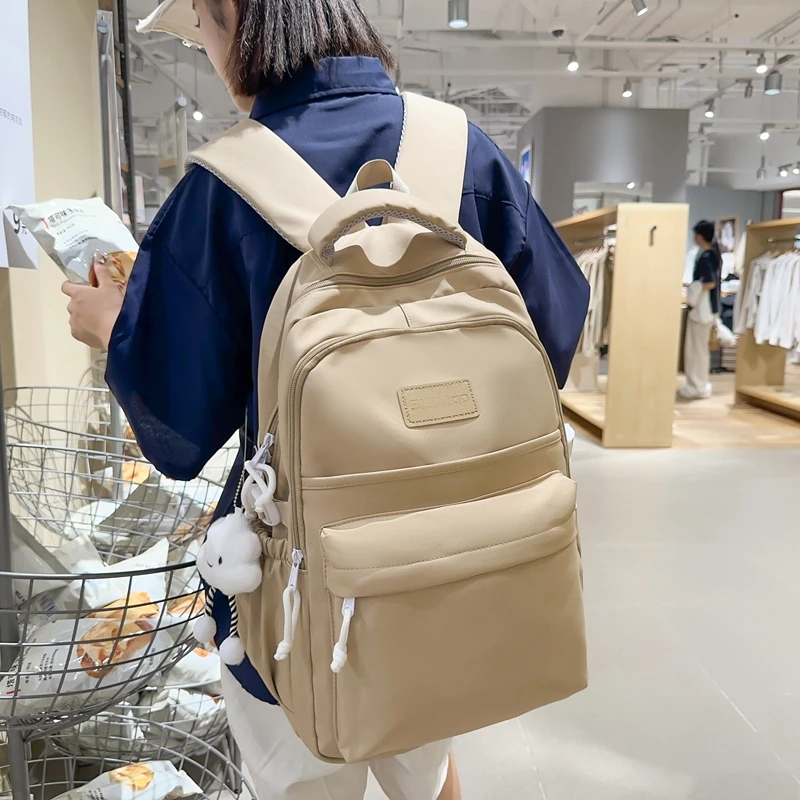 高颜值书包女初中生女生可爱大容量高中学生双肩包小学生简约背包