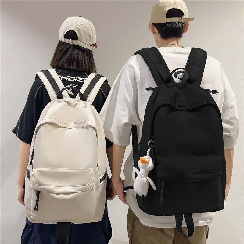书包女大学生大容量高中生简约黑色背包男生白色旅行包男款双肩包
