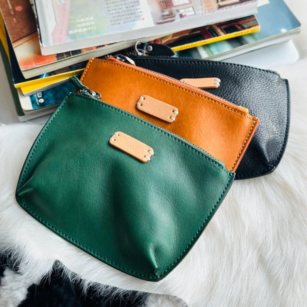 【17.5*15*11】头层牛皮复古手拿包洗漱化妆包大容量零钱证件收纳包