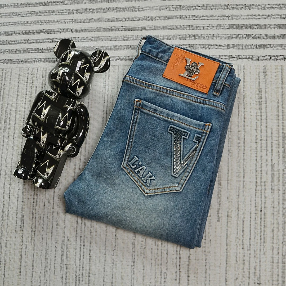 春夏款男士轻奢弹力修身小脚高端牛仔裤水洗中腰蓝色