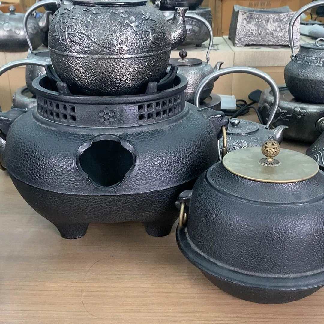 1w***r一套鬼面风炉+一把海浪飞鹤砂铁壶1800毫升