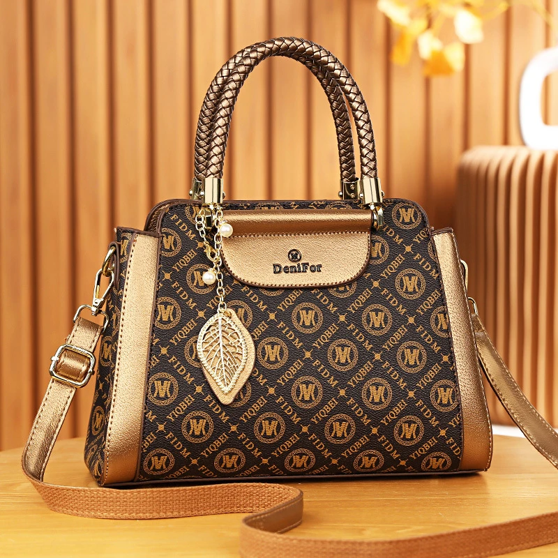 气质轻奢2025新款通勤百搭包印花手提包大气单肩包编织中年妈妈包