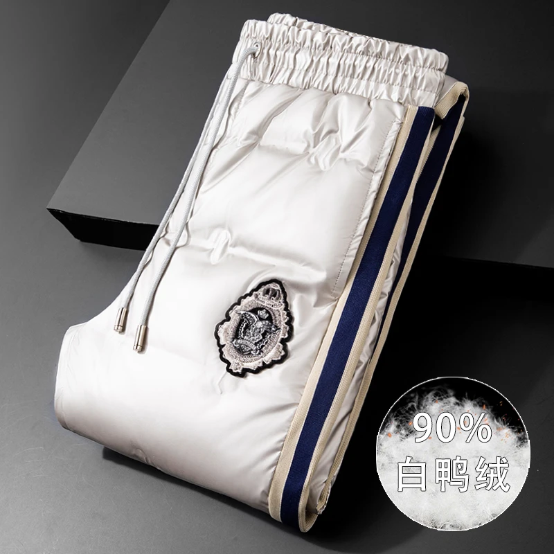 冬季御寒高档织带白鸭绒保暖卡其色羽绒裤男女同款防水防风加绒裤