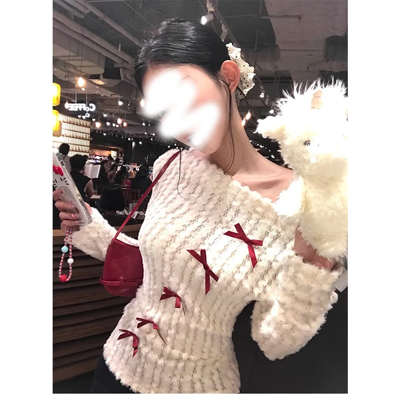 新年秋季温柔气质设计感蝴蝶结白色打底衫显瘦露肩斜领针织上衣女