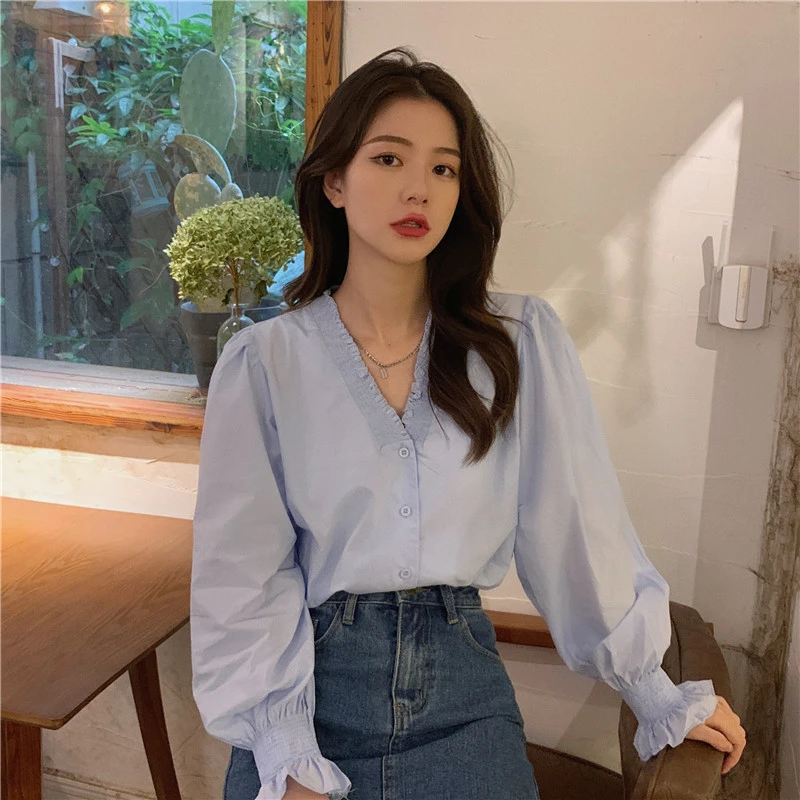 秋季新款韩版气质显瘦长袖设计感褶皱木耳边泡泡袖V领小众衬衫