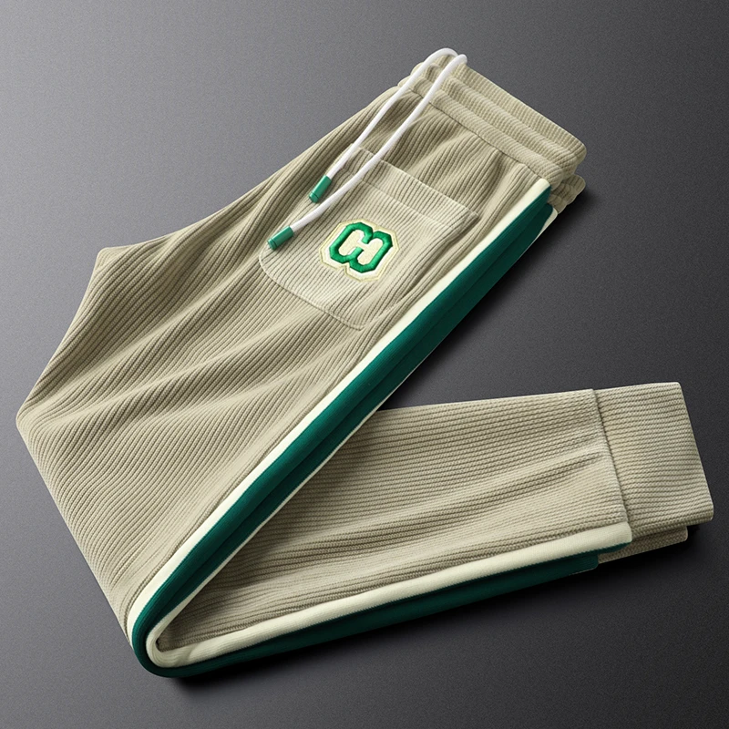 轻奢秋冬杏色灯芯绒休闲裤男束脚修身弹力男士侧条纹彩色运动卫裤