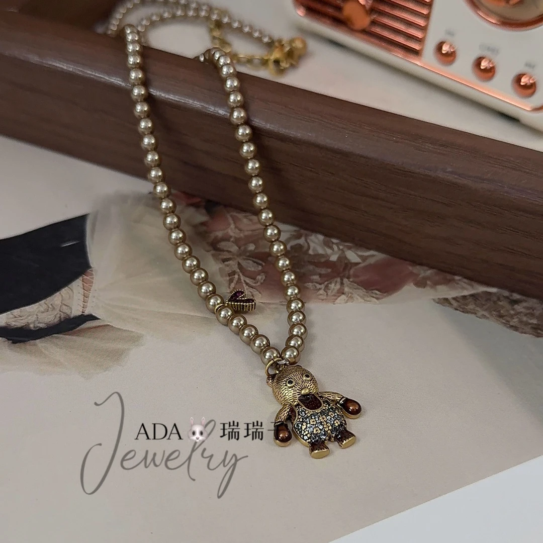 铜合金仿珍珠项链 028 拳击小熊咖啡金色珠珠项链