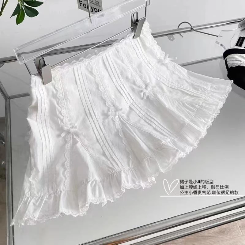2025夏季少女白色蕾丝花边半身裙高腰女小众设计感压褶拼接薄短裙