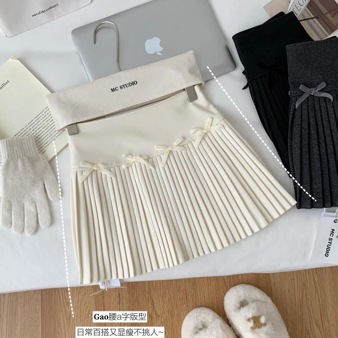 百搭2025冬新款耶诞芭蕾裙毛呢百褶时尚冬季蝴蝶结高腰A字半身ins