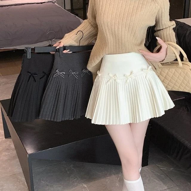 设计感蝴蝶结白色毛呢百褶秋冬加厚高腰显瘦半身裙A字短裙子女ins