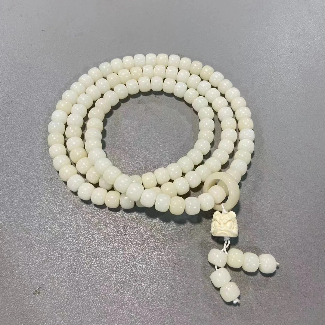 P243羊脂白 菩提 卡1.0桶珠带醒狮配饰多圈手串