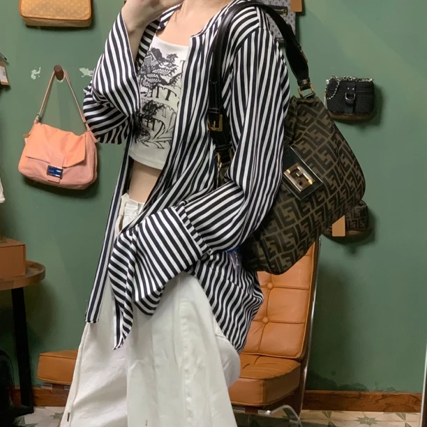 95新 FENDI/芬迪 A1193棕老花大胖丁单肩包