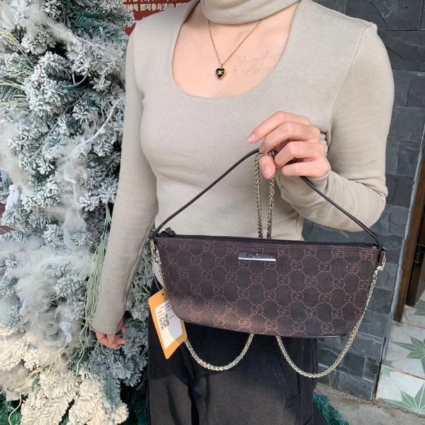 95新 GUCCI/古驰 G176 棕花饺子小船腋下手提单肩包经典