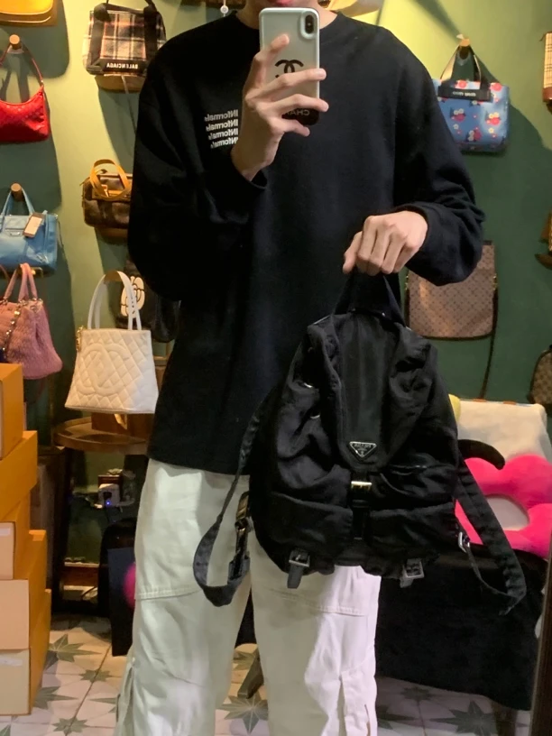 95新 Prada/普拉达 H039黑色帆布双肩包百搭休闲抽绳简约时尚