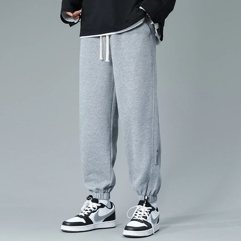 春秋款小皮标卫裤休闲裤潮流青少年男女同款百搭宽松束脚长裤579