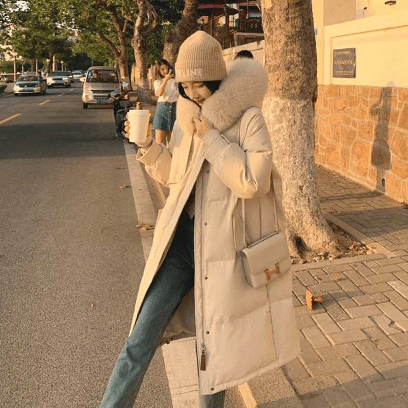 以纯2023冬季新款韩版时尚连帽保暖羽绒服女中长款设计感宽松长款
