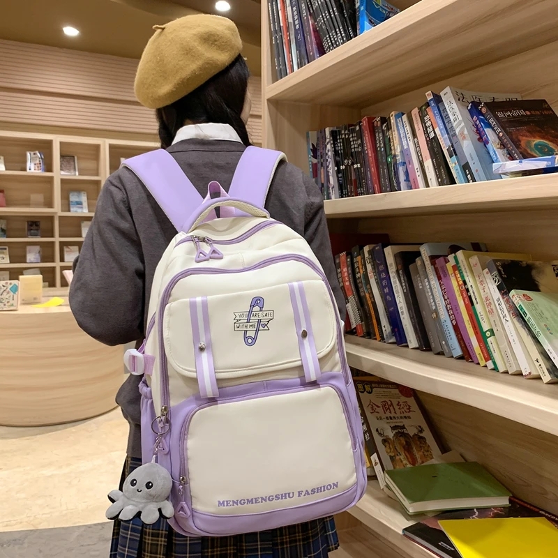 减负护脊超大容量中学生初中生书包女生高中生小学生新款双肩背包
