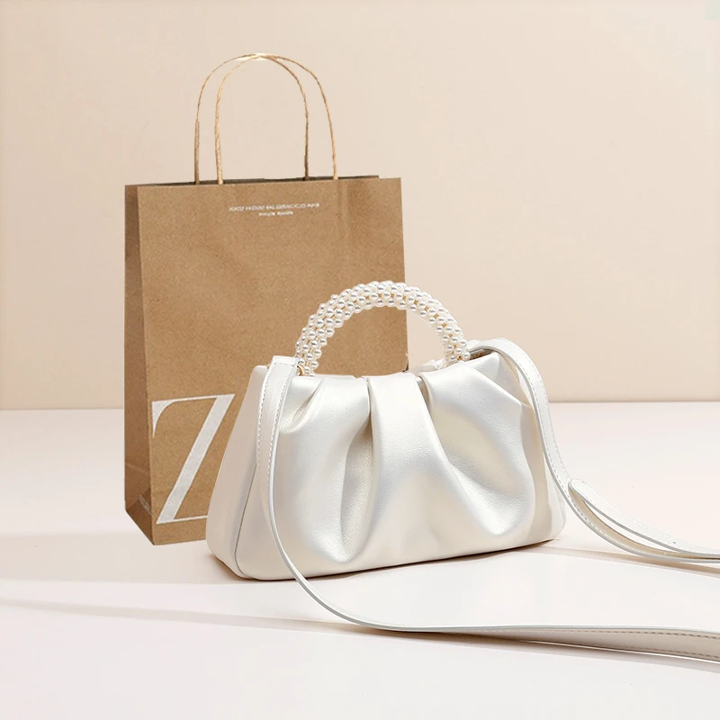 明星同款小众珍珠链褶皱手提单肩云朵包2025新款气质小包包旗袍包