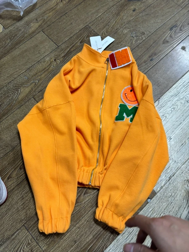 橘色笑脸潮牌外套