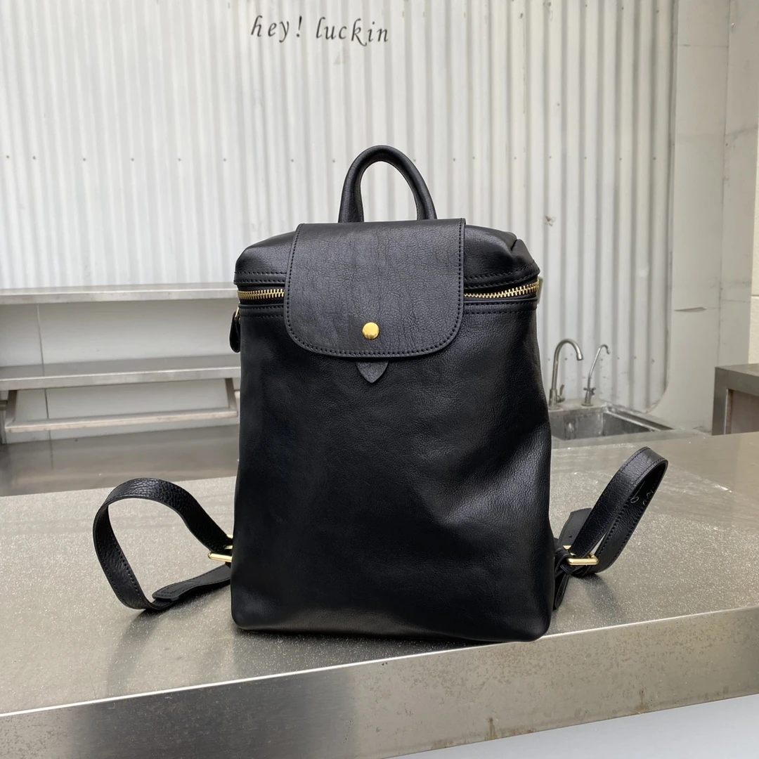 【真皮时代】女士双肩斜跨包时尚休闲百搭经典简约潮流双肩包76139