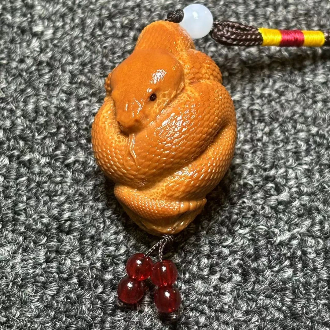 巴西大橄榄核雕刻 蛇 3.3左右 手把绳穿配 单籽