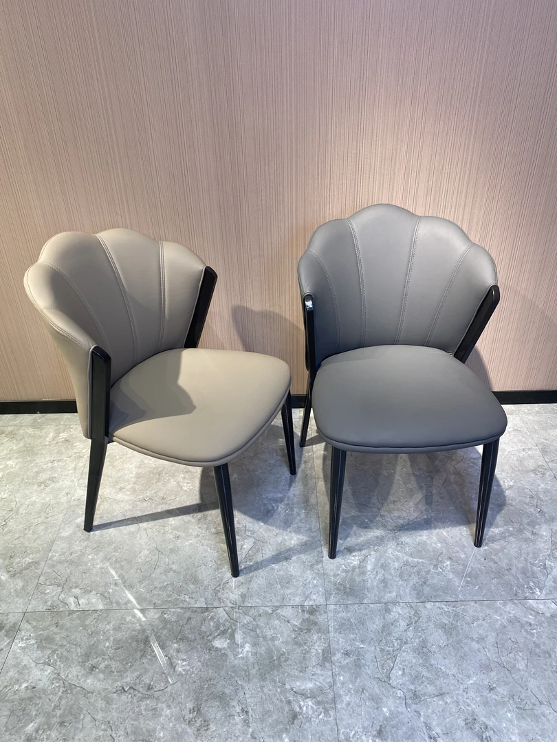 餐椅家用轻奢高级感现代简约休闲椅耐刮皮书桌网红设计师花瓣椅子