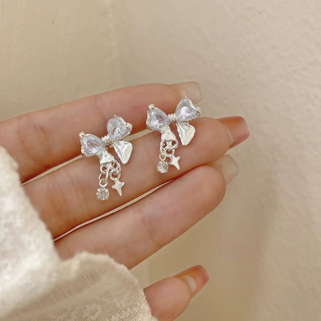 925银耳饰 星光璀璨蝴蝶结甜美女小众设计感时尚气质潮耳环