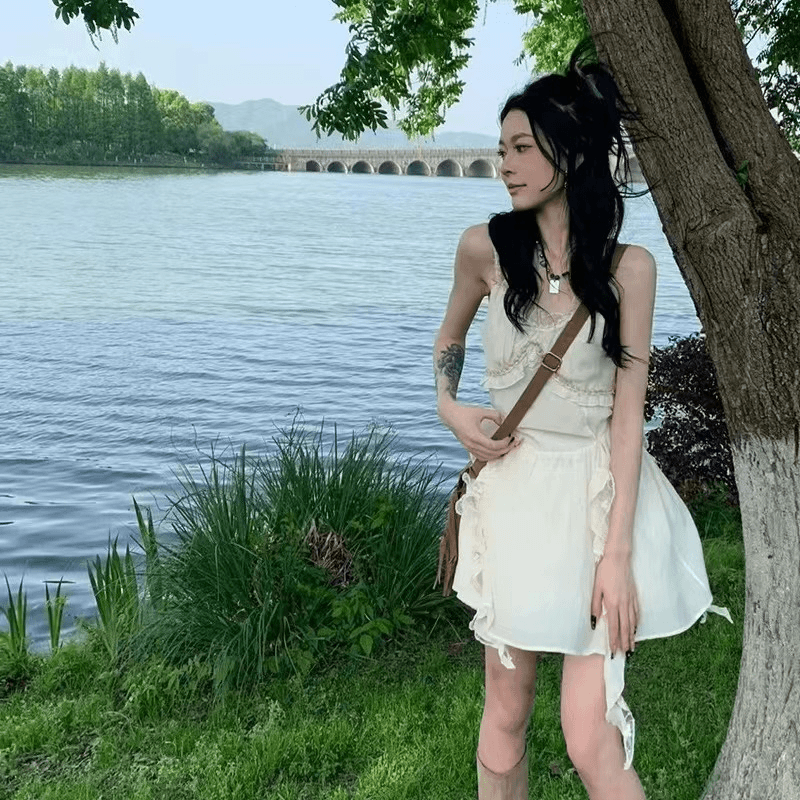 枯叶蝶 小众波西米亚风吊带连衣裙女夏不规则裙摆收腰短裙