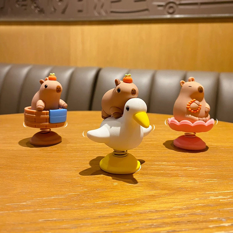 卡皮巴拉水豚摇摇乐桌面摆件女生创意解压礼物车载中控台装饰礼品