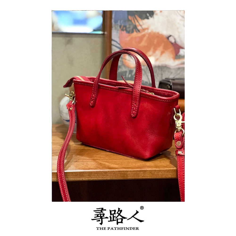 寻路人百搭通勤风小巧简约大气气质女士牛皮手提斜挎包篮子包