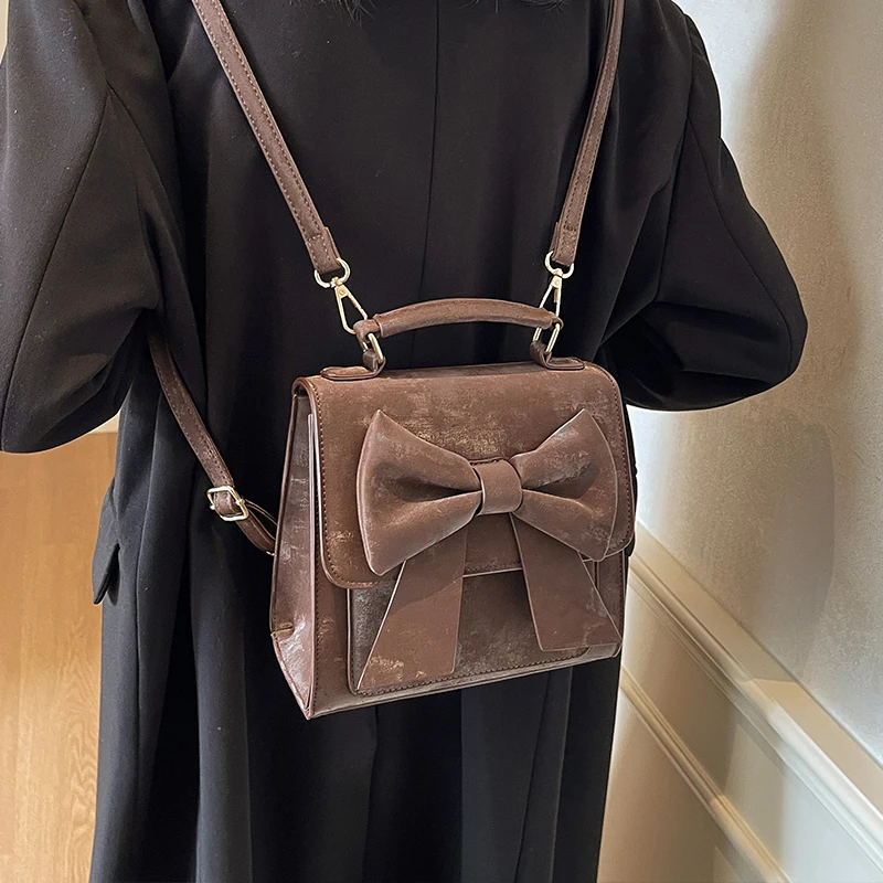 艾米兔女包今年新款学院风时尚蝴蝶结双肩包包女洋气可爱单肩包