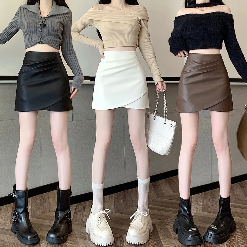 时尚不规则褶皱短皮裙女2025秋冬新款防走光包臀显瘦PU皮裙半身裙