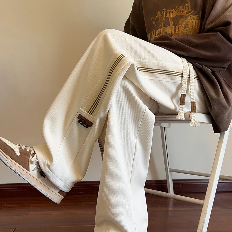 春秋新款青少年男生纯色简约垂感显高卫裤系带松紧常规休闲阔腿裤