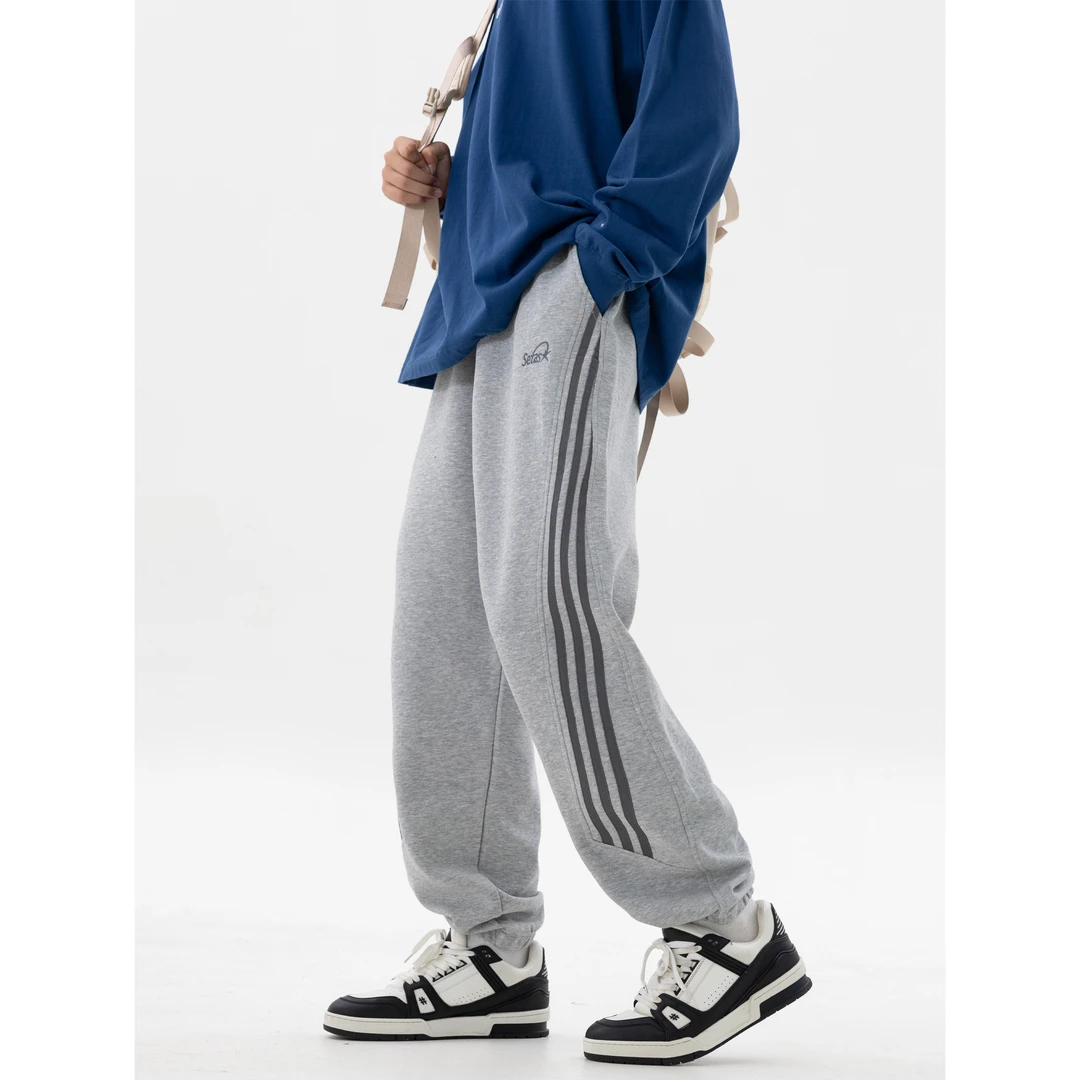 加绒卫裤青少年时尚休闲潮流加大码针织织带宽松冬季时尚长裤