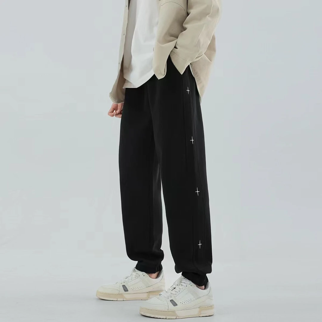 春秋款青少年休闲潮流加大码绣花简约时尚针织休闲裤高街春季卫裤