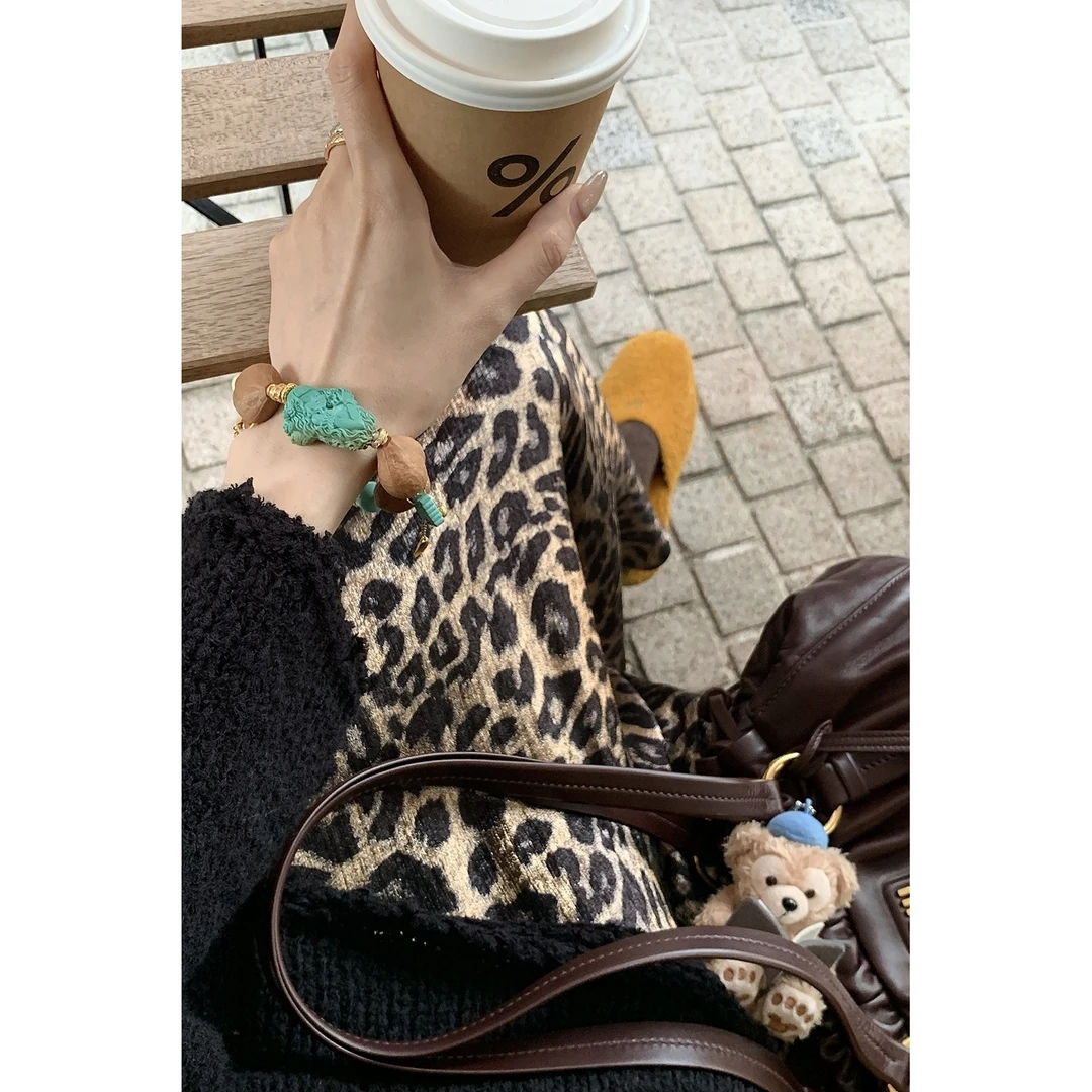 FBB limit秋冬新款辣妹裙子烫金工艺斜裁百搭豹纹半身裙D243992F