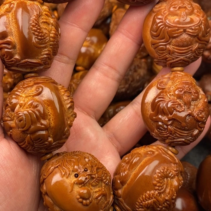 橄榄核吊坠姚*菊橄榄核手持