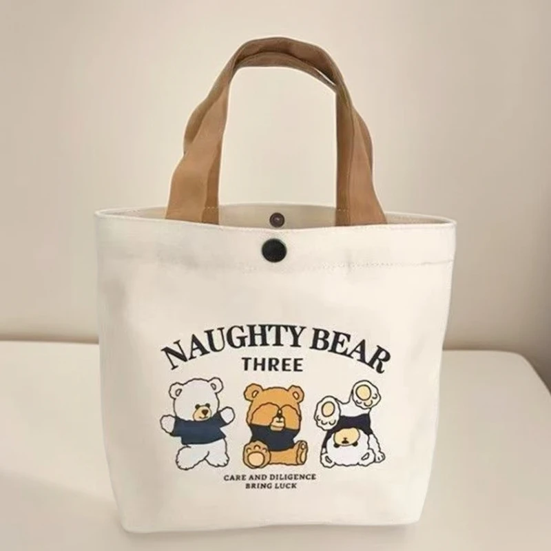 帆布包小巧卡通百搭手提包女学生饭盒袋简约手提袋子上班族便当包