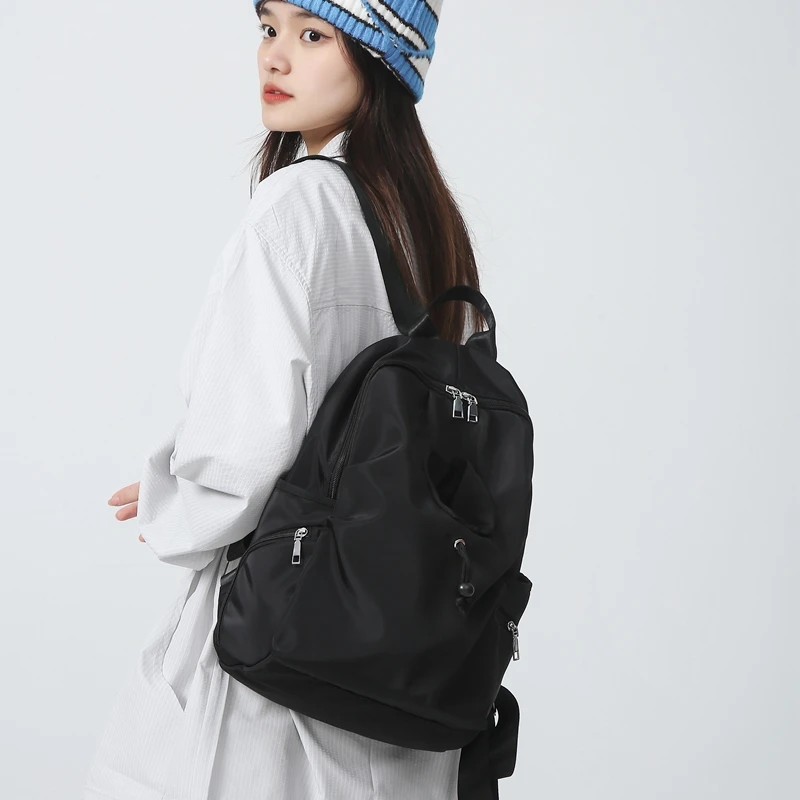 SWAGONE简约百搭休闲学院风旅行双肩包户外运动徒步超轻登山包包