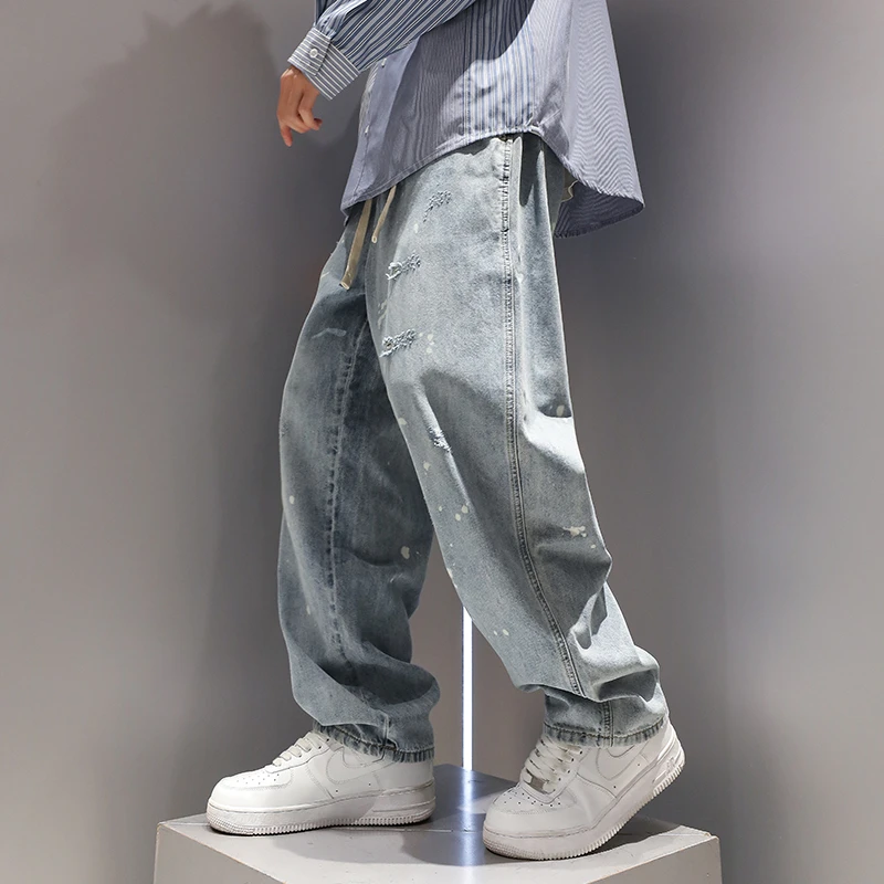 有术浅蓝色破洞水洗直筒牛仔裤男春秋款松紧腰潮牌时尚流行长裤