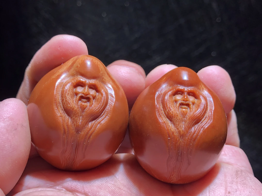精品大籽橄榄核手把件寿星