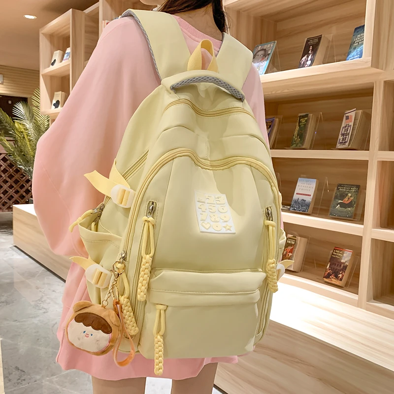 高颜值书包女生日系背包初中生大容量大学生黄色轻便高中双肩背包