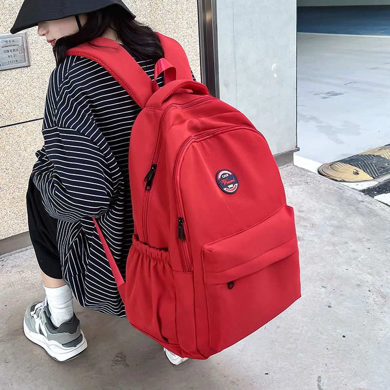 书包女大学生大容量纯色简约学生双肩包初中生高中生百搭旅行背包