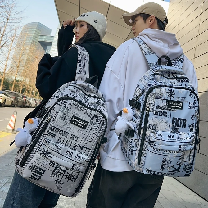 书包女大容量工装风休闲潮酷背包男大学生电脑包中学生涂鸦双肩包