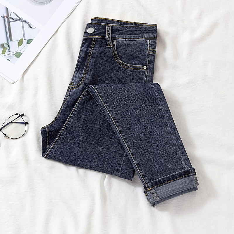 黑色高腰加大牛仔裤女春秋冬新款显瘦修身铅笔九分紧身小脚裤子