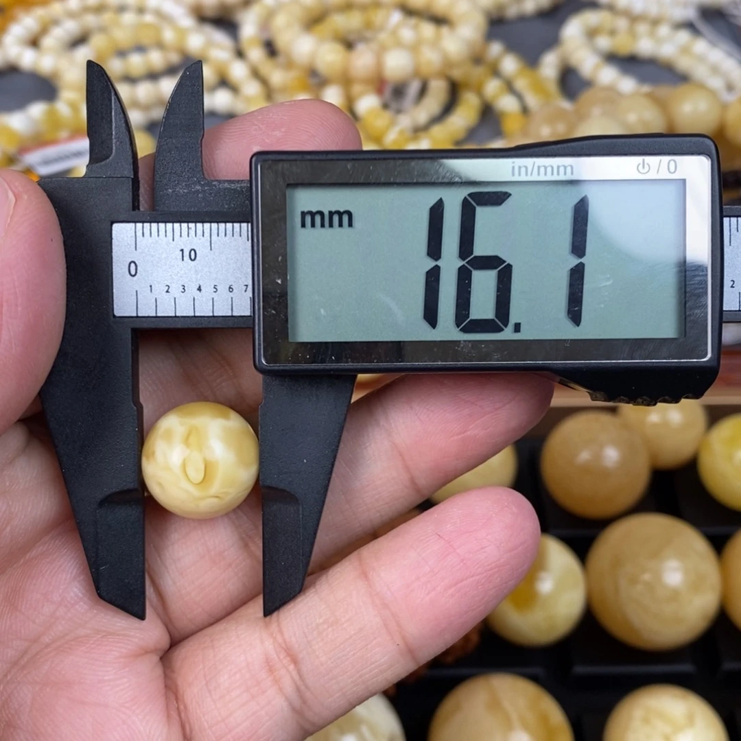 琥珀珠宝奇石未镶嵌遇****生有花粉