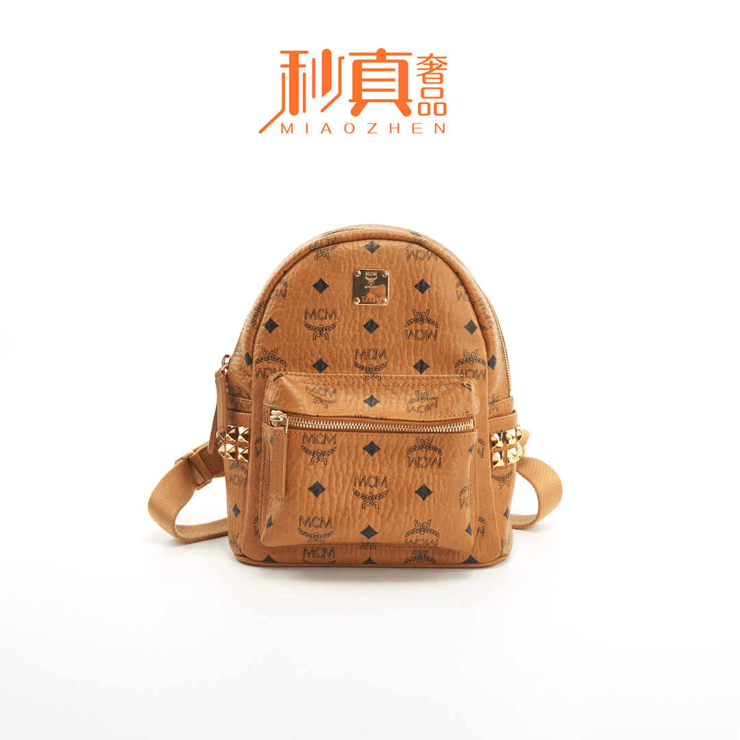 95新  秒真奢品/MCM/97新/ 侧边铆钉双肩背包小/公价7800/3100A4
